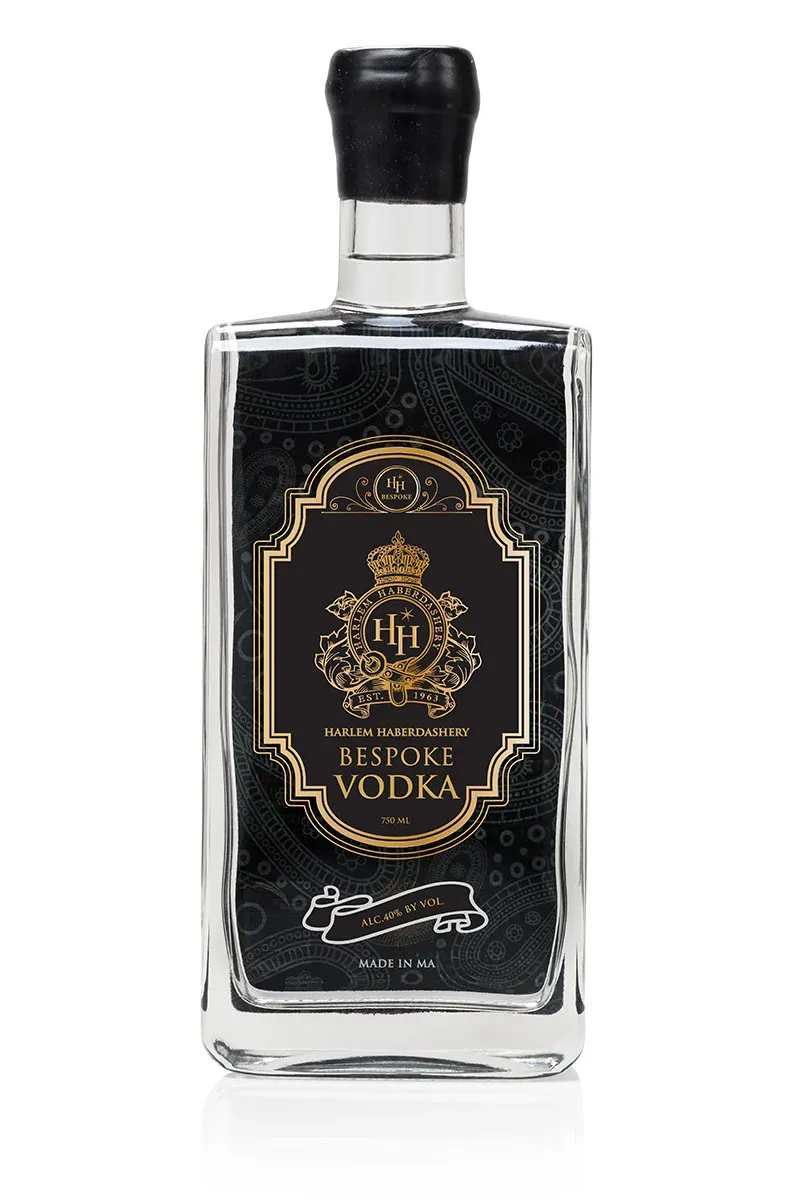 Front view of an HH Bespoke vodka bottle with a black cap and a gold crest label on a white background